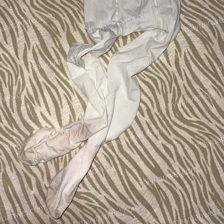 一条奶白色洛丽塔厚白原味丝袜的平铺照片，脚部穿着痕迹明显 - 缩略图